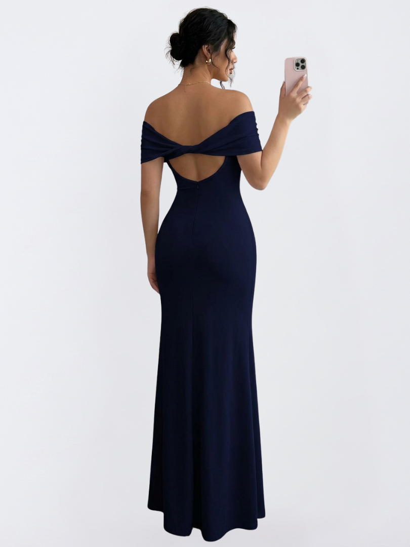 Detail of the elegant off-shoulder neckline on a navy bodycon maxi dress, designed for formal wear.
