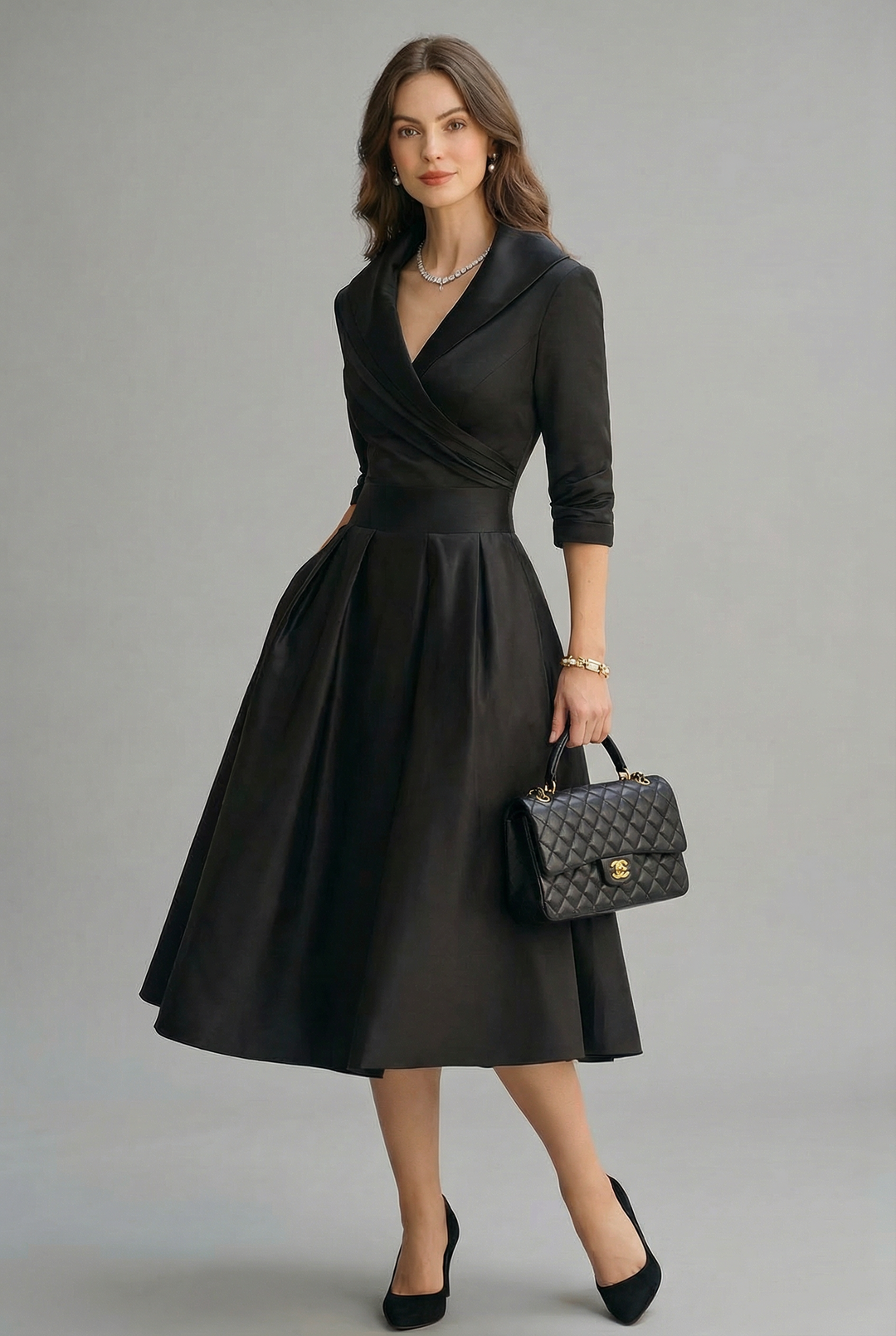 Elegant navy wrap midi dress with flattering flared skirt, three-quarter sleeves.