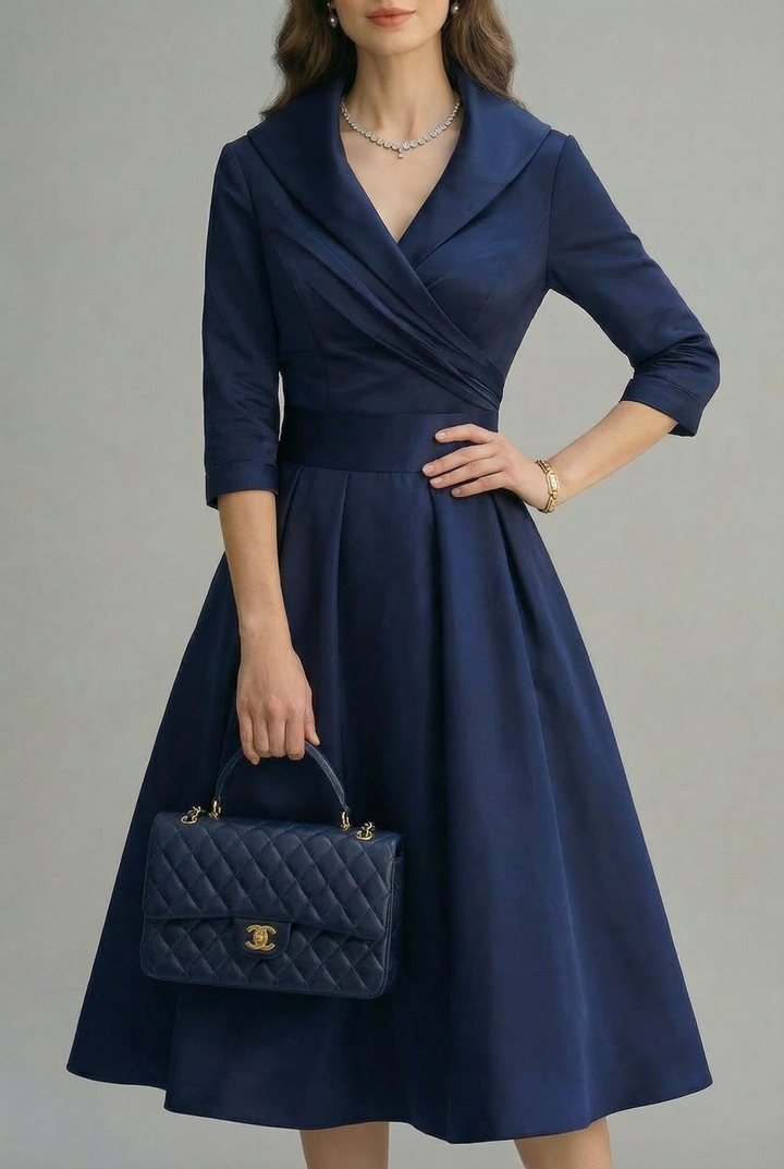 Day to night versatile midi dress, featuring a flattering wrap and flare.