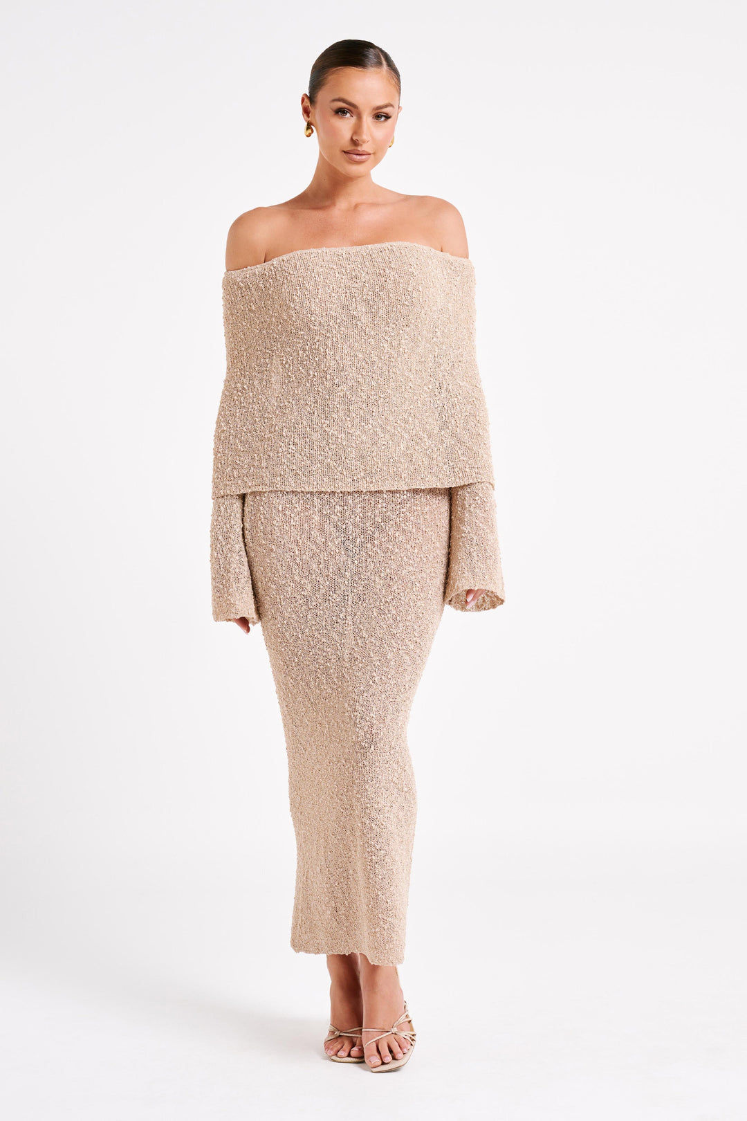 Pure white formal off-shoulder maxi dress, flowing & feminine with elegant long sleeves.