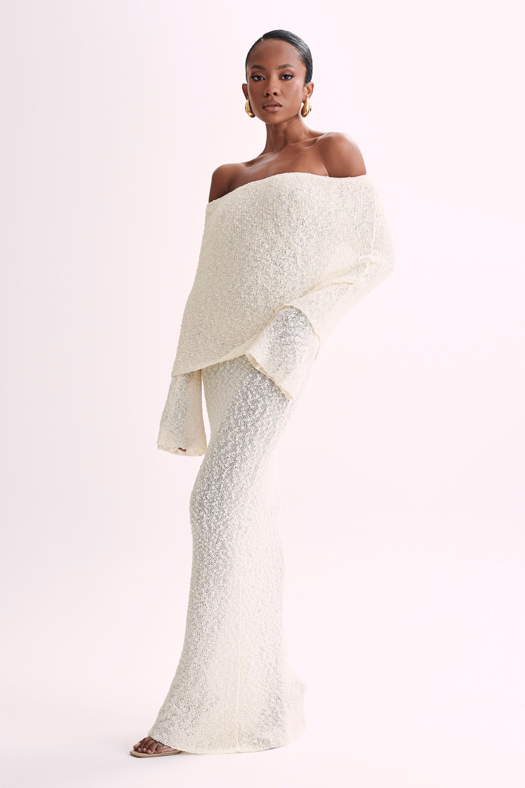 Grey textured off-shoulder maxi dress, feminine & sophisticated for formal events.