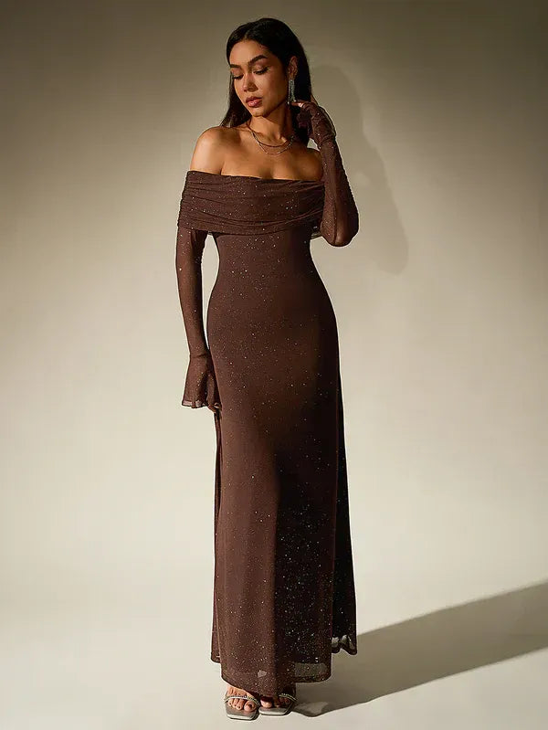 Elegant off-shoulder maxi dress with sheer long sleeves, perfect for formal events.