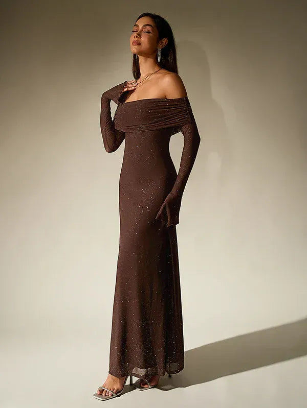 Sophisticated evening gown featuring an off-the-shoulder neckline and delicate sheer sleeves.