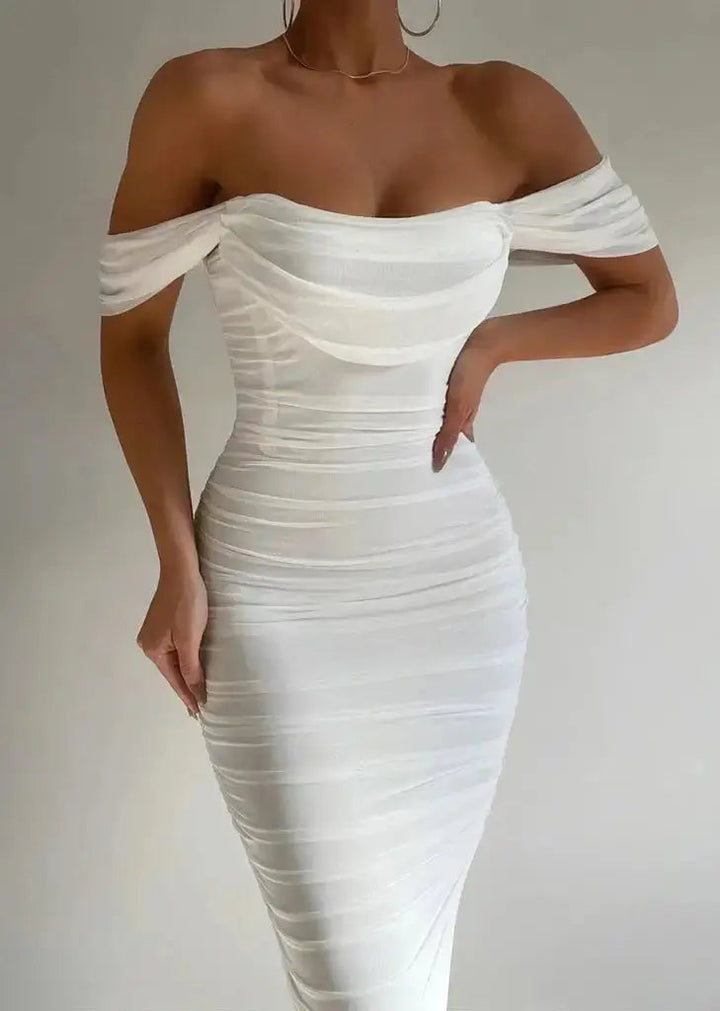 Close-up of an elegant off-shoulder midi bodycon party dress. Features a sleek, flattering fit for women.
