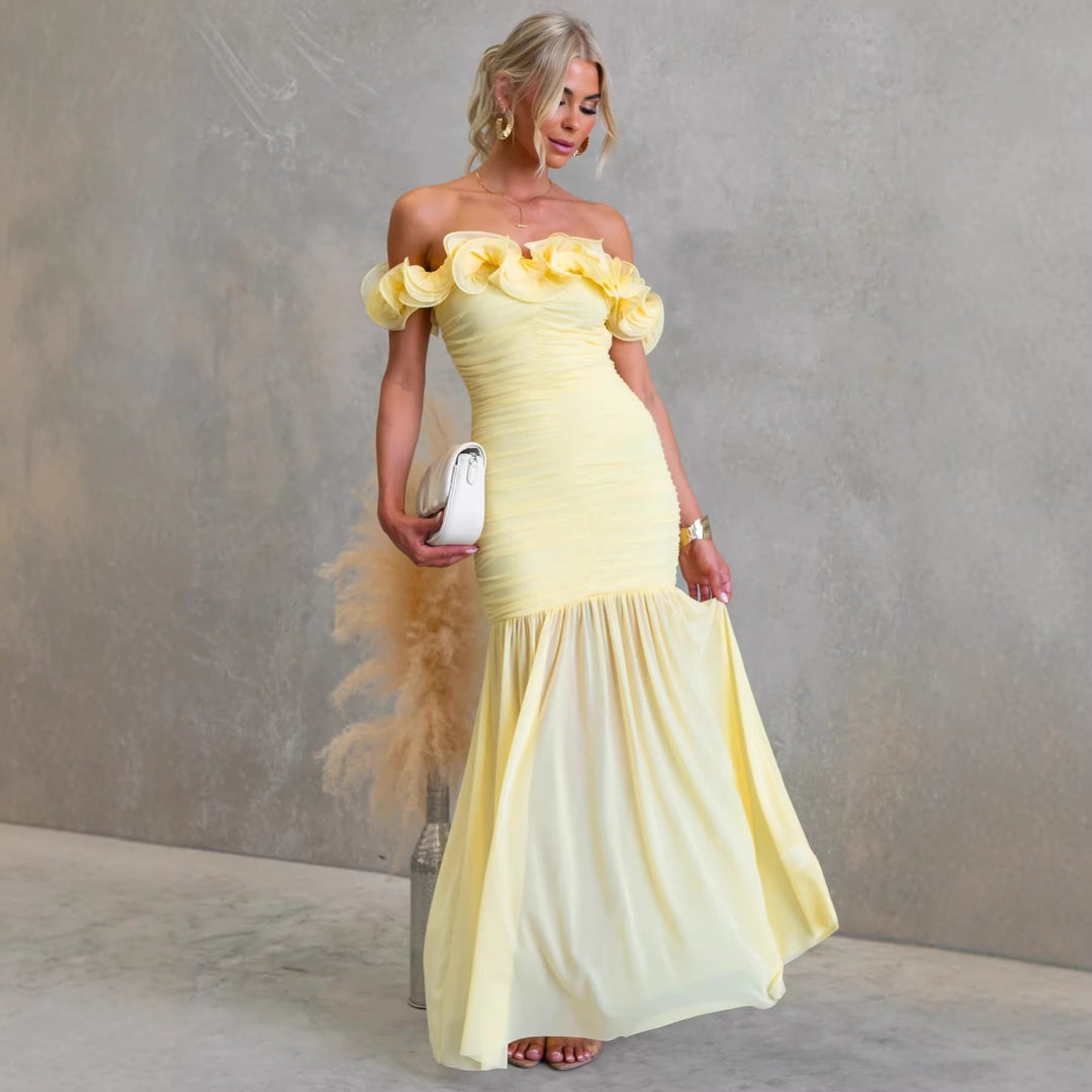 Women's off-shoulder maxi dress with elegant ruffles, ideal for formal events & wedding guests.