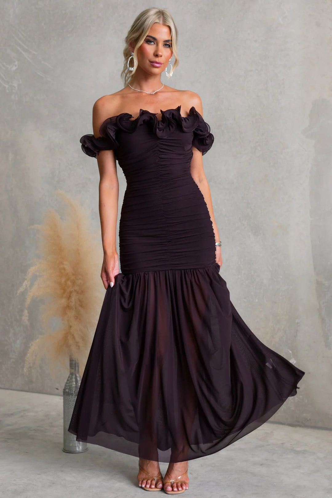 Ruffled off-shoulder maxi dress for women, suitable as an elegant wedding guest outfit.