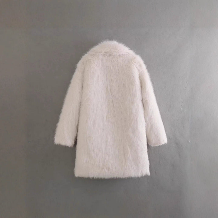 Women's winter fashion: a soft, elegant faux fur jacket in off-white.