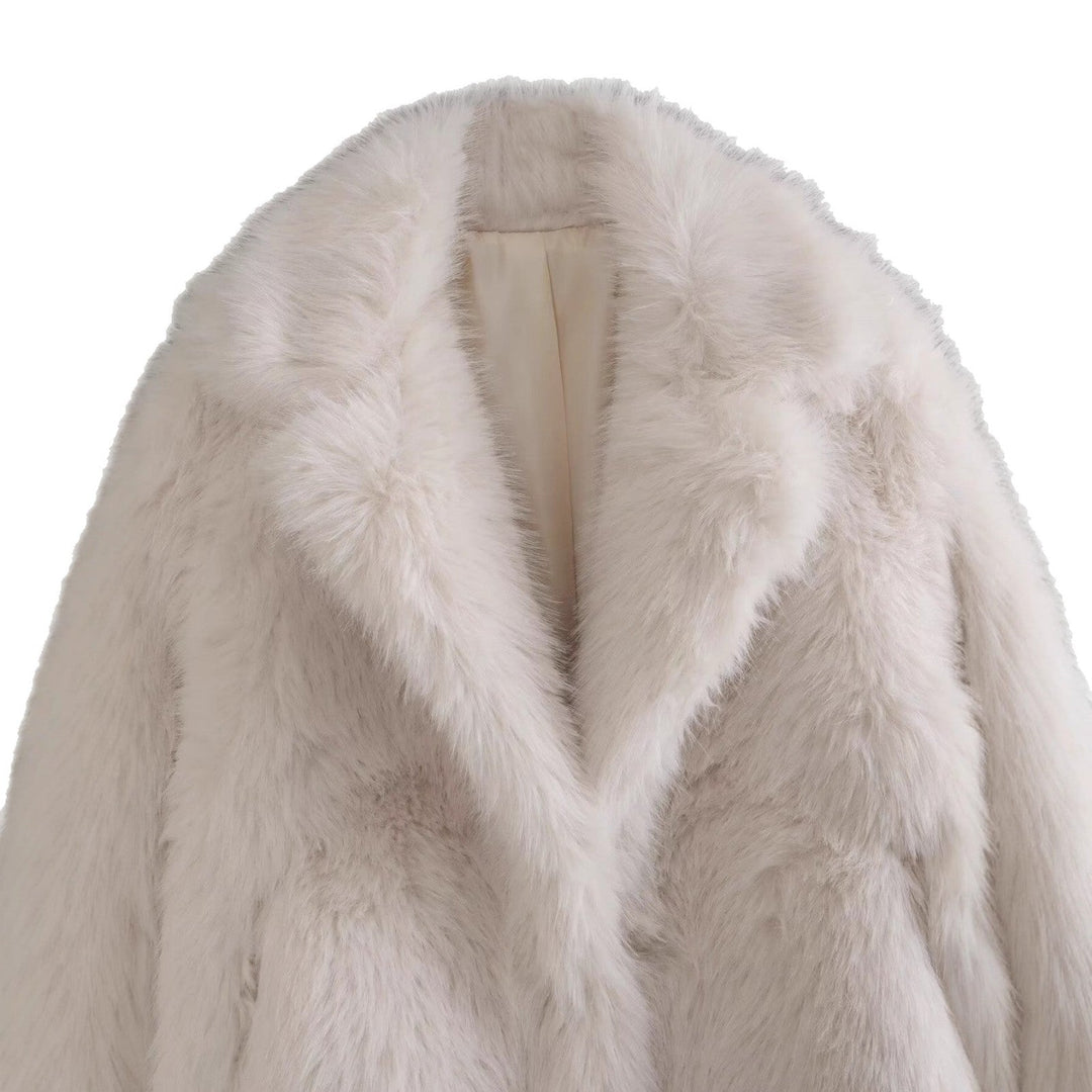 Stay warm and stylish with this elegant women's off-white faux fur jacket.
