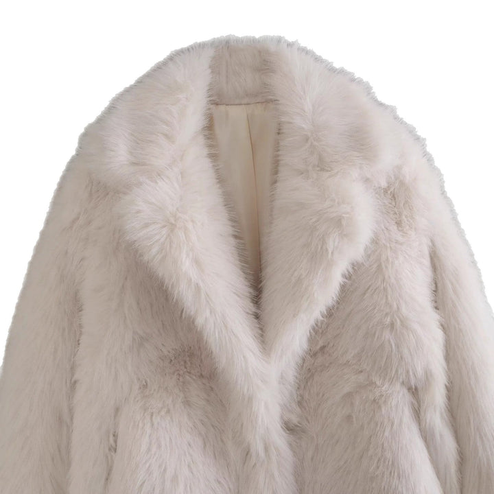 Stay warm and stylish with this elegant women's off-white faux fur jacket.