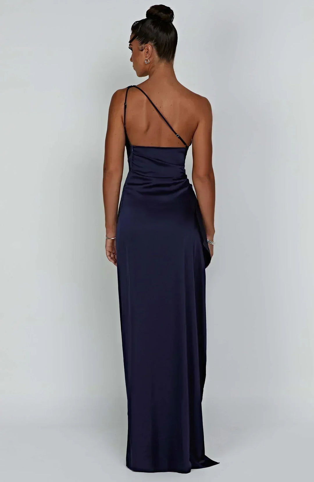 Women's fashion: one-shoulder maxi dress with a sophisticated high slit.