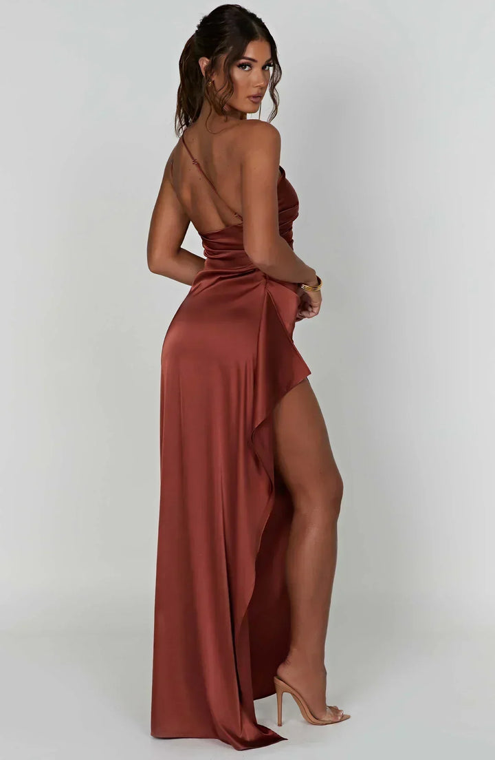 Women's red carpet ready one-shoulder maxi, stunning high leg slit.