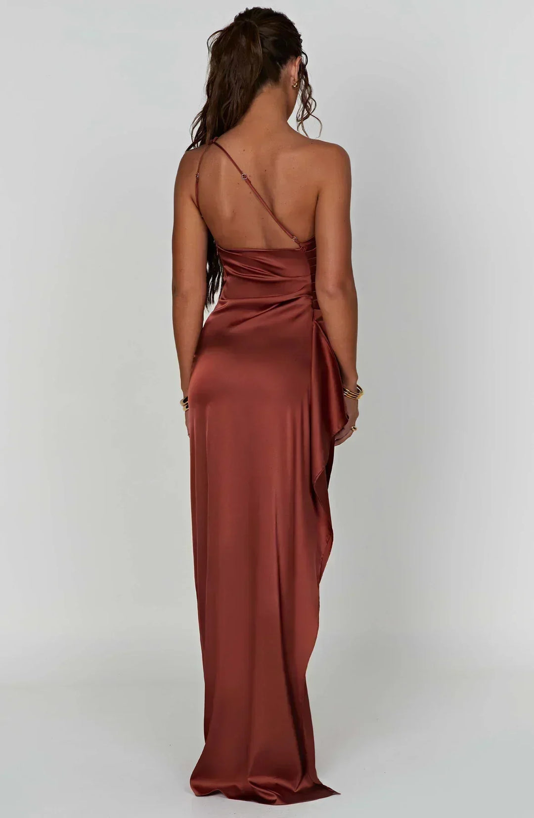 Elegant one-shoulder women's dress, maxi length, high slit detail, party ready.