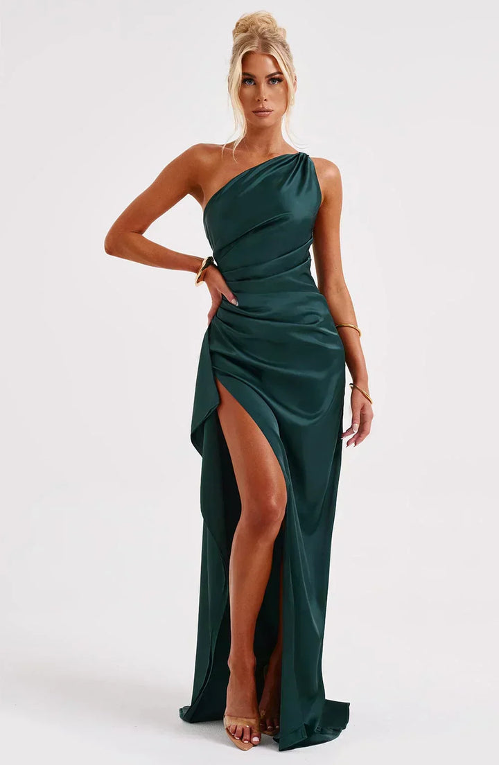 Women's party wear: one-shoulder maxi gown with an elegant high slit.