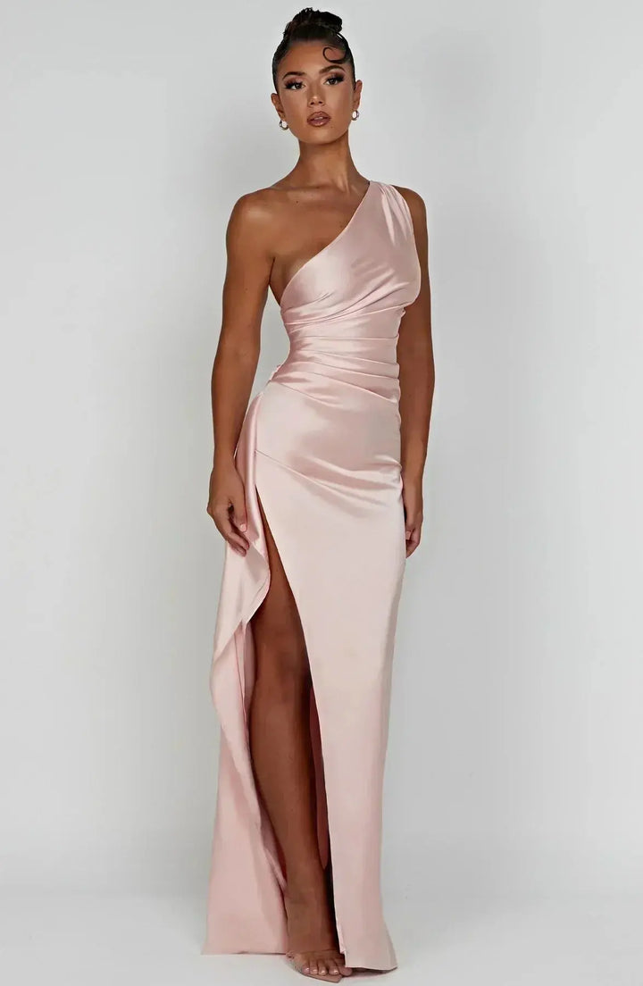 Glamorous one-shoulder evening maxi dress, ruched waist, flowing silhouette.