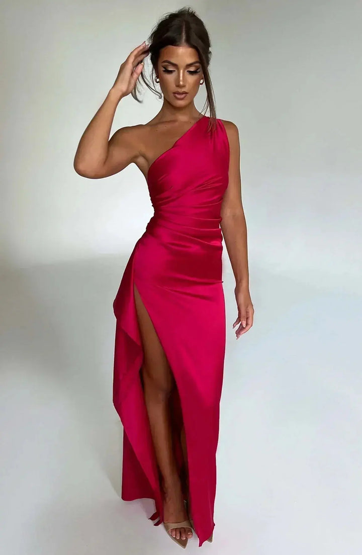 Chic women's one-shoulder evening gown with ruched waist and high slit.