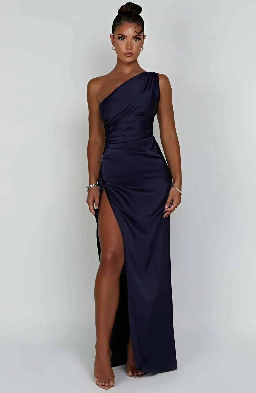 Women's one-shoulder maxi dress, ruched waist detail, elegant and modern.