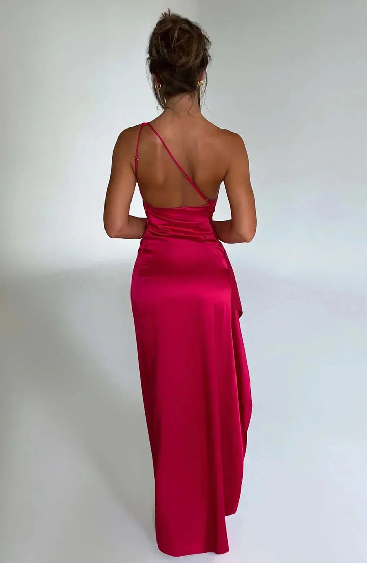 Stunning formal maxi dress, one-shoulder design, ruched waist, ideal for wedding guests.
