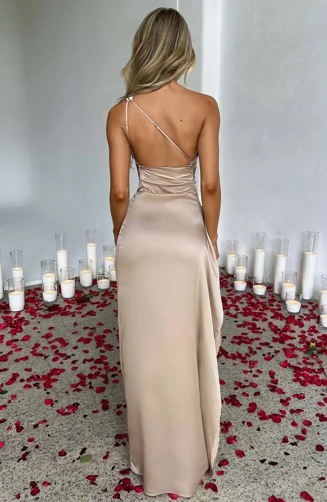 Glamorous one-shoulder formal dress for women, ruched waist detail.