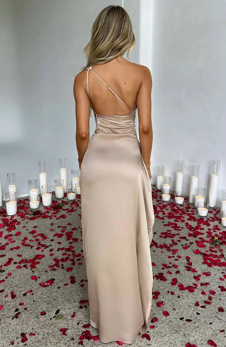 Glamorous one-shoulder formal dress for women, ruched waist detail.