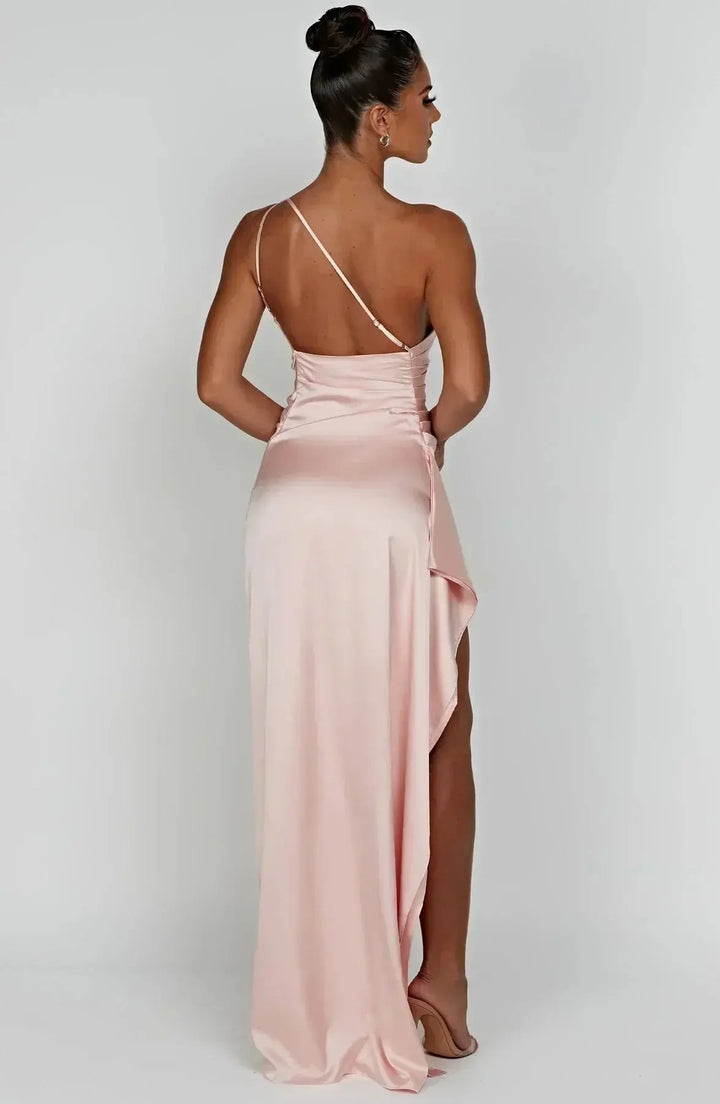 Chic one-shoulder wedding guest maxi dress, ruched waist detail.