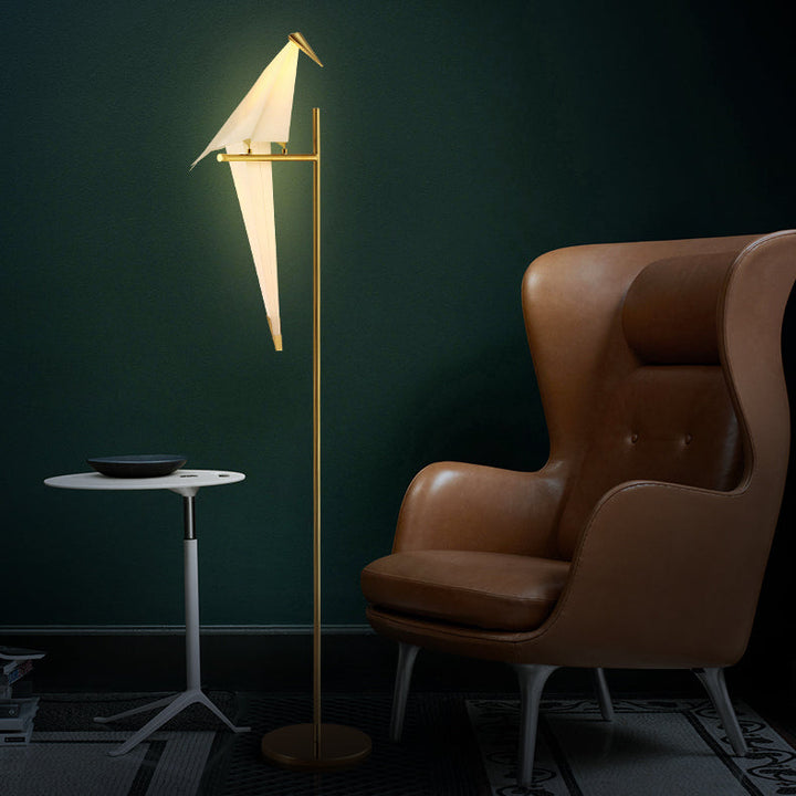 Stylish unisex origami bird floor lamp, offering an elegant accent light for modern living spaces.