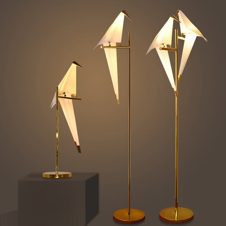 Decorative origami bird light for tables, an elegant and ambient lamp creating a soothing atmosphere.