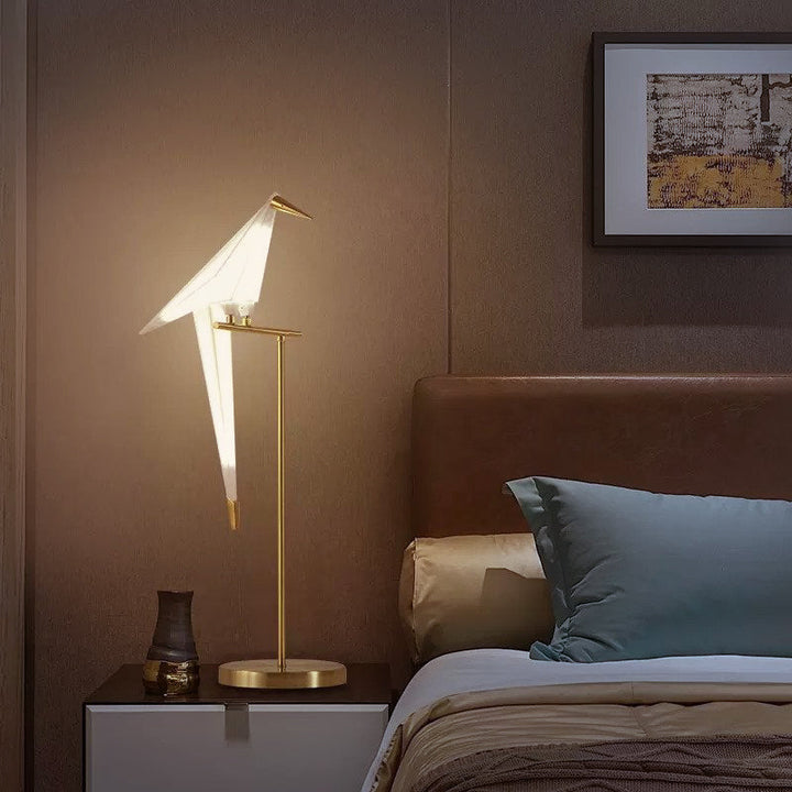 Accent origami bird lamp, wireless magnetic design for versatile placement as a decorative table or floor light.