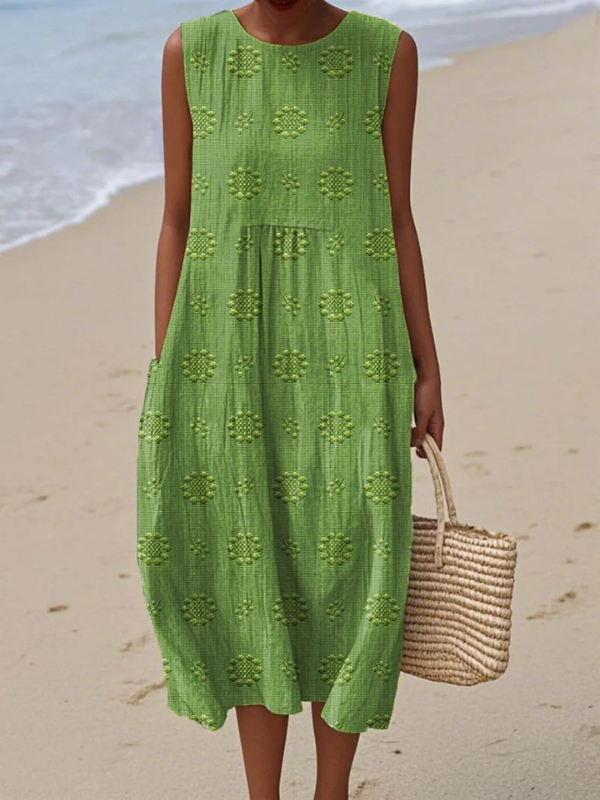 Elegant patterned sleeveless midi dress for women, perfect for chic comfort. Versatile for summer casual wear.