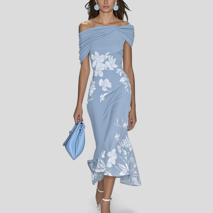 Stylish patterned midi dress, offering an effortless look for women. Perfect for spring fashion & versatile events.