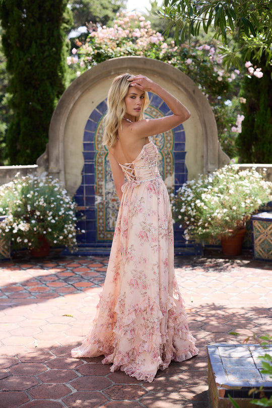 Elegant women's textured maxi dress in a soft pink, ideal for spring/summer formal events.