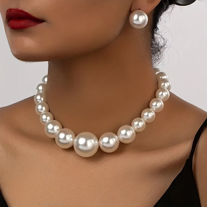 Elegant pearl necklace and matching earrings set for women, perfect for special occasions, timeless graceful jewelry.
