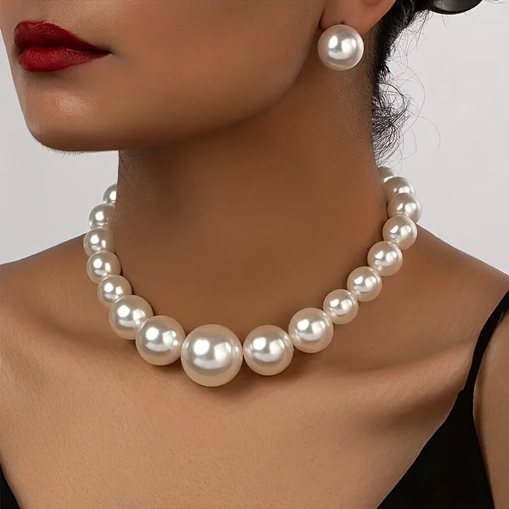 Elegant pearl necklace and matching earrings set for women, perfect for special occasions, timeless graceful jewelry.