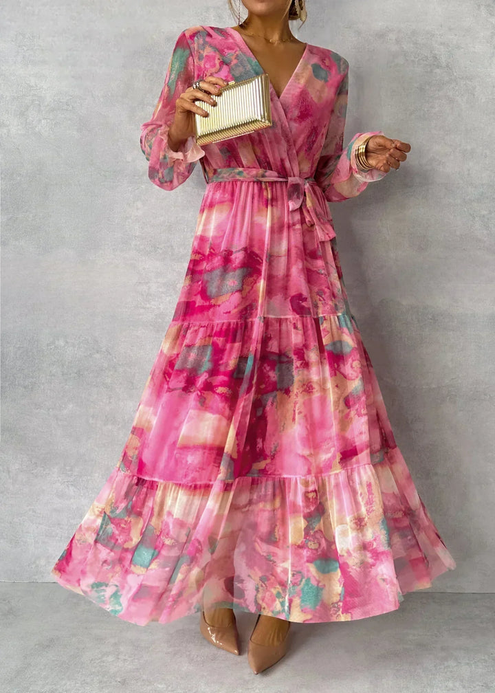Elegant pink floral wrap maxi dress for women, perfect as a wedding guest or summer party dress.