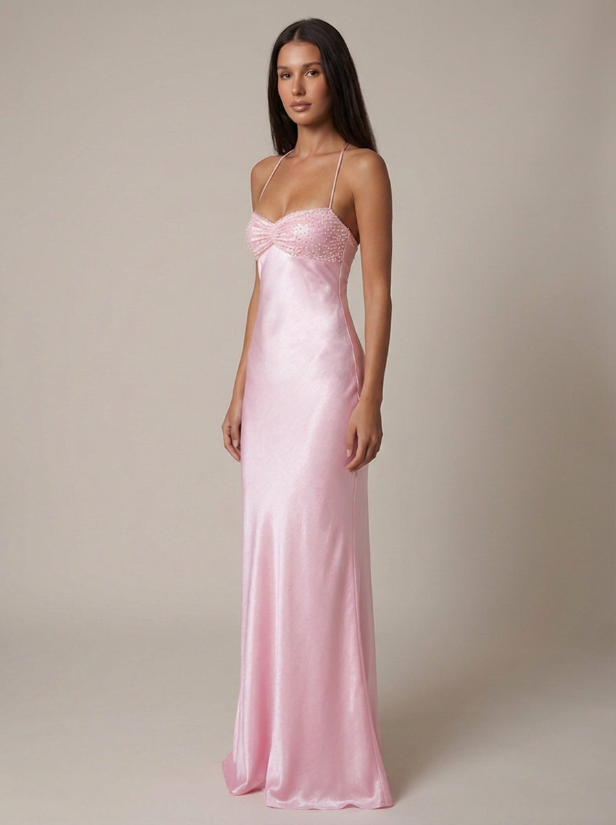 Women's elegant halter maxi dress in pink, ideal for special occasions, features a stylish lace-up back.