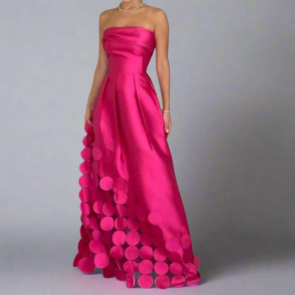 Stylish women's pink maxi dress, ideal for summer occasions, formal events, and elegant wedding guest attire.