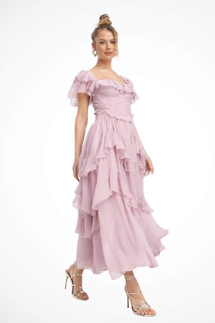 Women's elegant off-shoulder ruffle corset & tiered maxi skirt set, ideal party dress for special occasions.