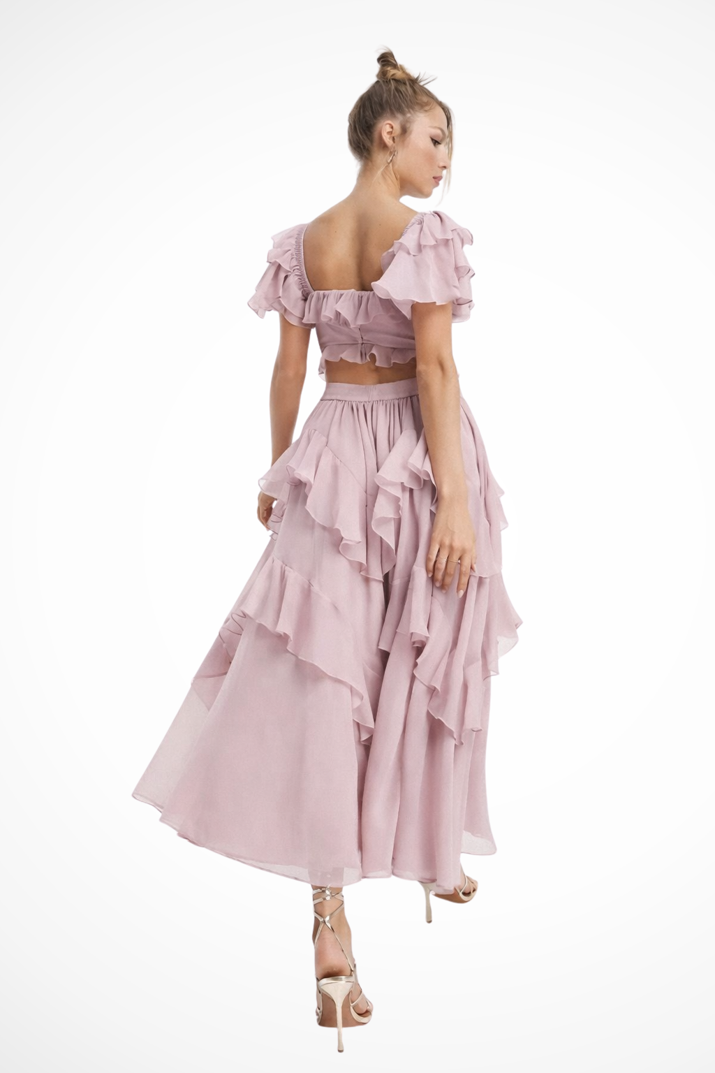 Stunning pink off-shoulder tiered maxi dress with elegant ruffles, a chic women's formal party or race day outfit.