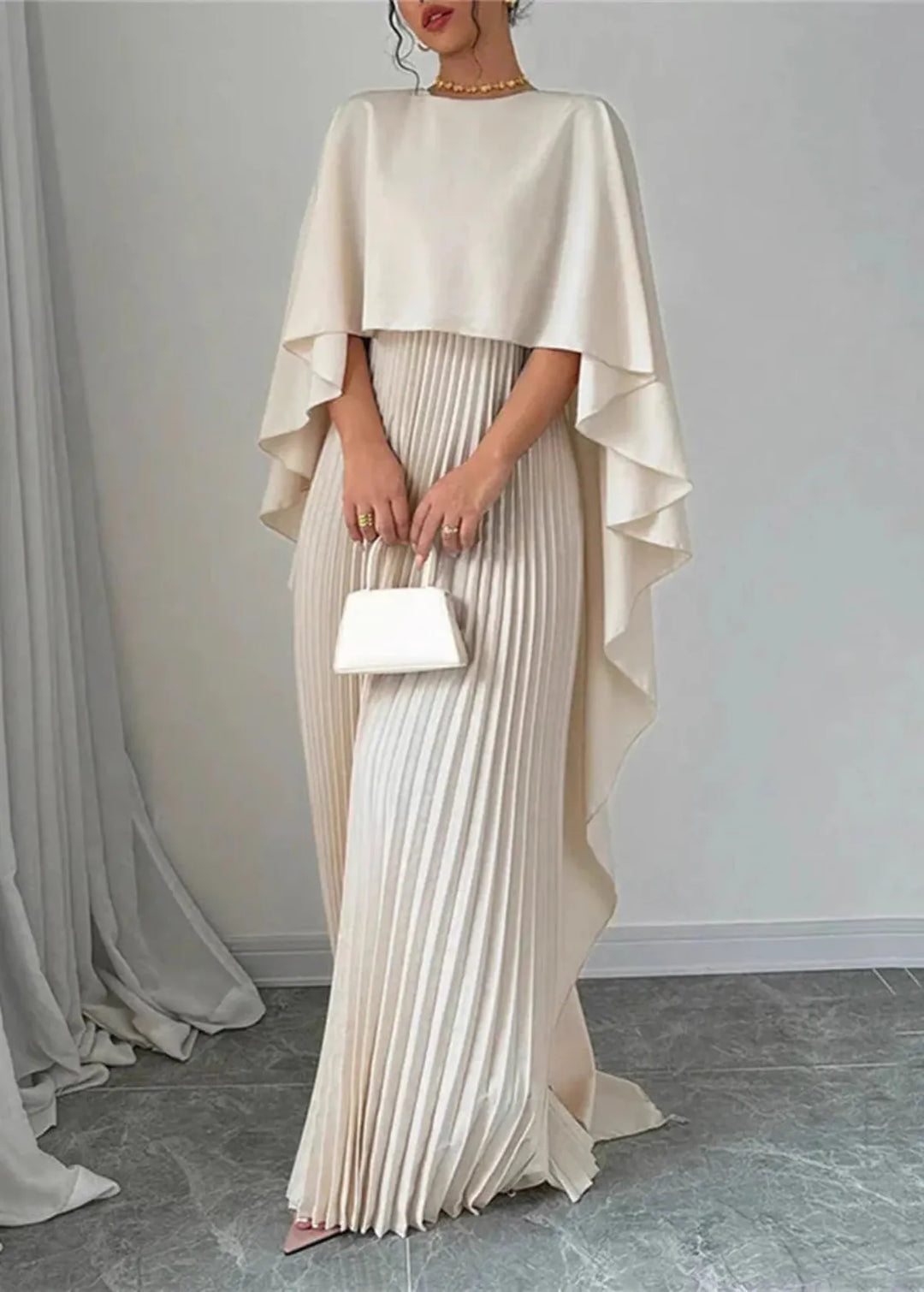 Chic women's elegant pleated cape maxi dress, a stunning choice for wedding guests, formal events, or evening wear.