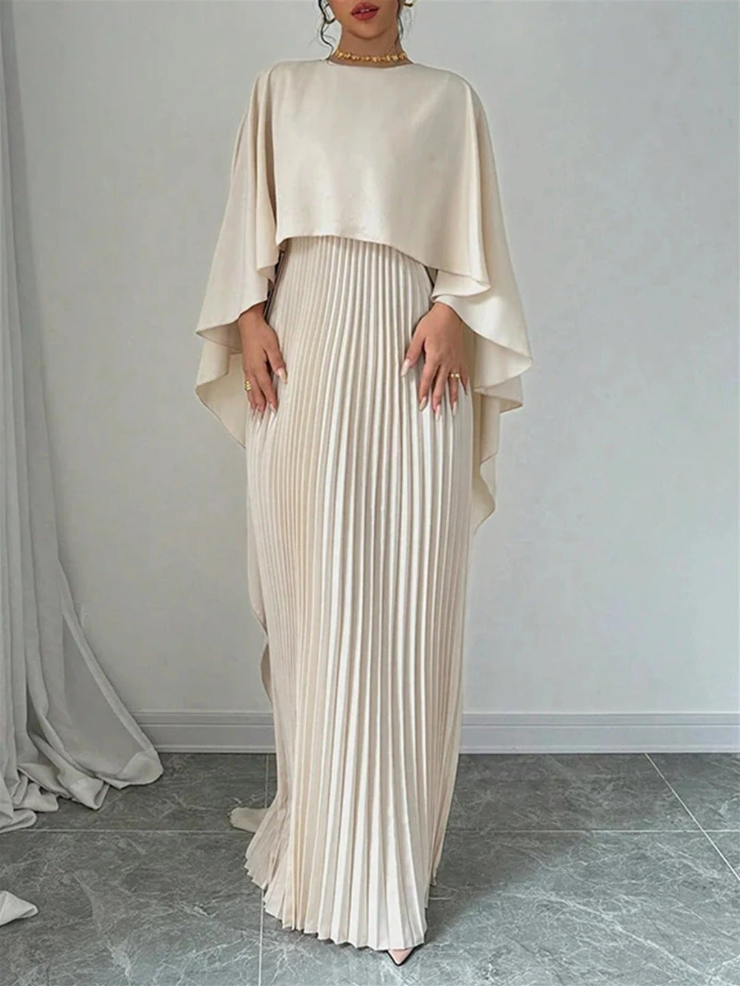 Elegant pleated cape maxi dress for women, perfect as a wedding guest formal gown.