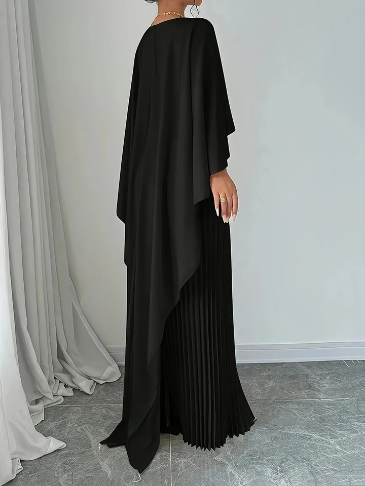 Flowing cape detail on a sophisticated women's pleated maxi dress, ideal for evening wear & special occasions.