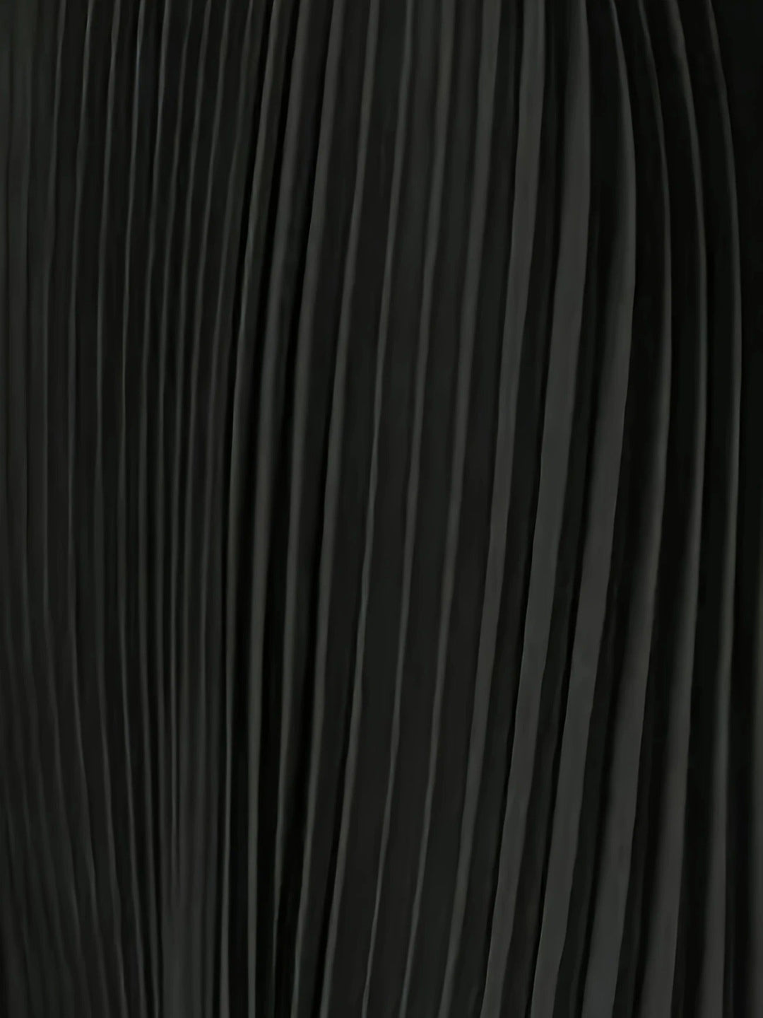 Model showcasing a chic women's pleated cape maxi dress, ideal for wedding guests & formal evening wear.
