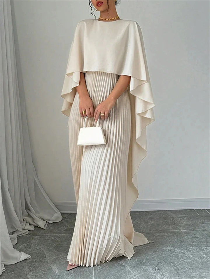 Formal pleated cape maxi dress for wedding guests & special occasions, elegant women's evening wear.