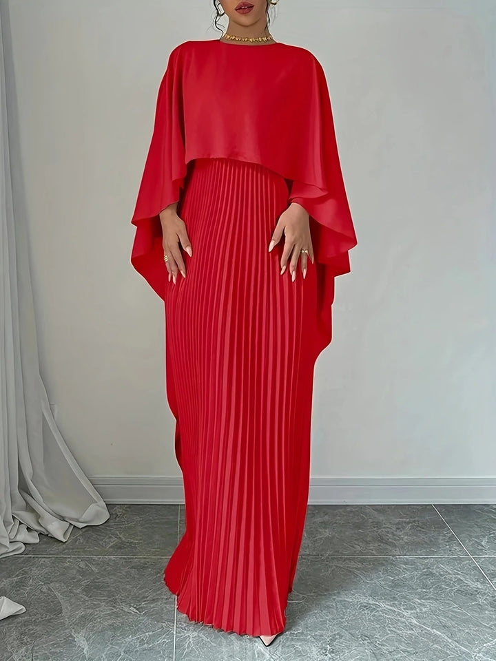 Back view of an elegant pleated cape maxi dress, perfect as a women's formal wedding guest gown.