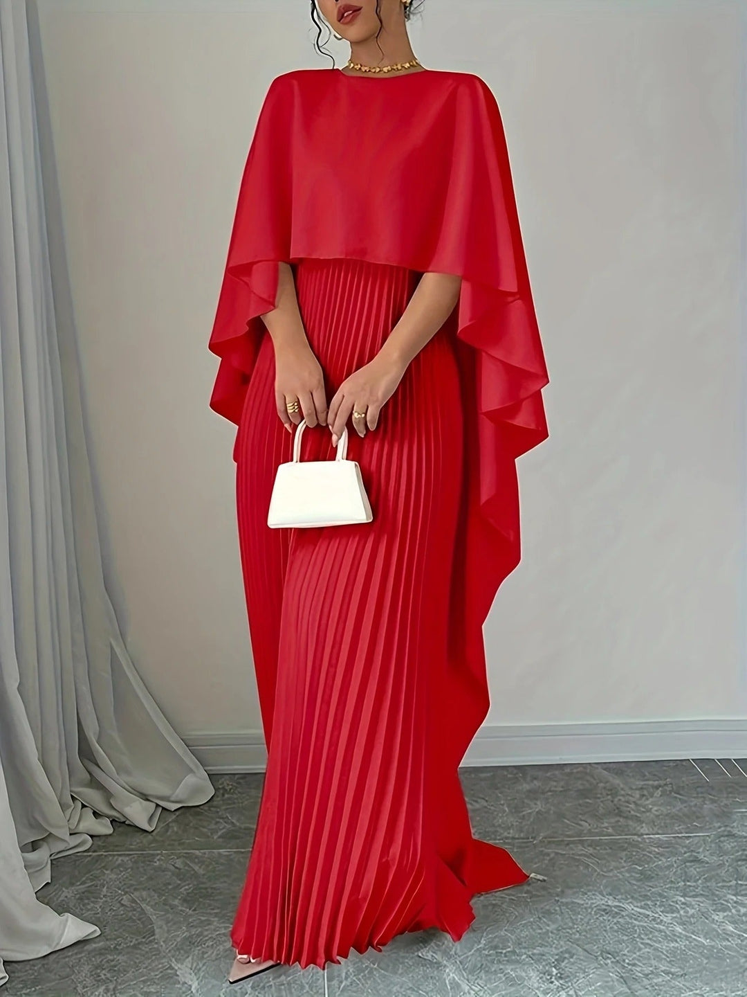 Classic women's pleated cape maxi dress, an elegant choice for any formal evening wear event.