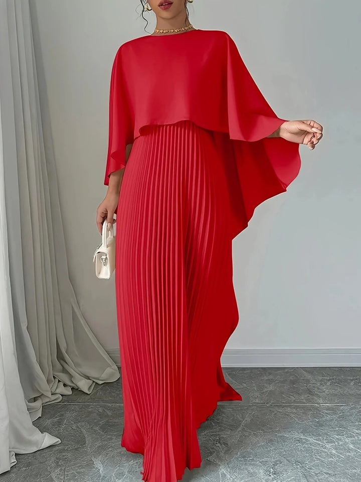 Flowing silhouette of a women's pleated maxi dress with a sophisticated cape, ideal for formal occasions.