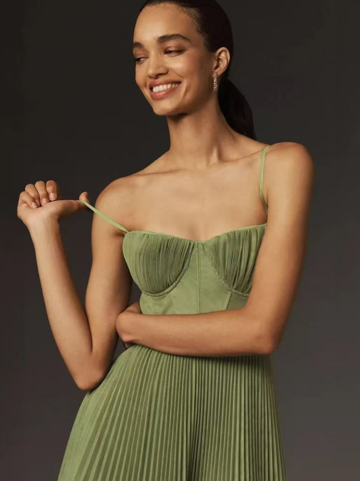 Sophisticated olive green pleated maxi dress, flowing & elegant for formal events.