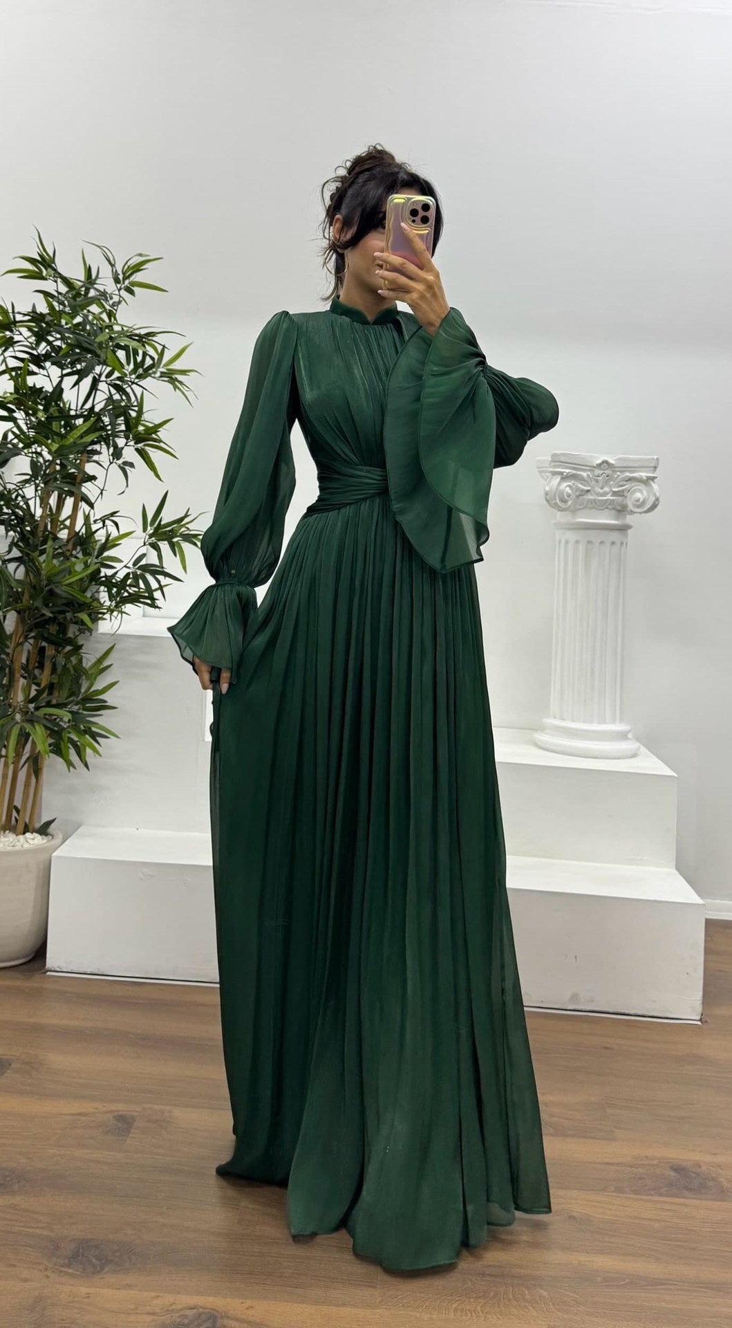 Women's elegant long sleeve pleated maxi dress for a classy look at any formal event or party.