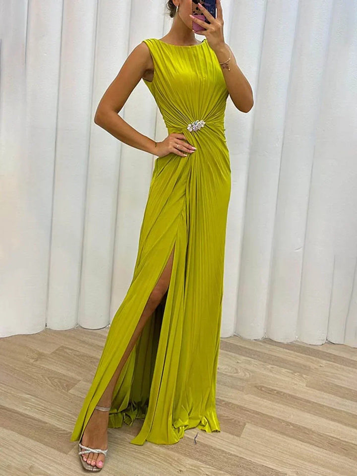 Elegant pleated sleeveless maxi dress for women, ideal as a wedding guest or formal event gown.