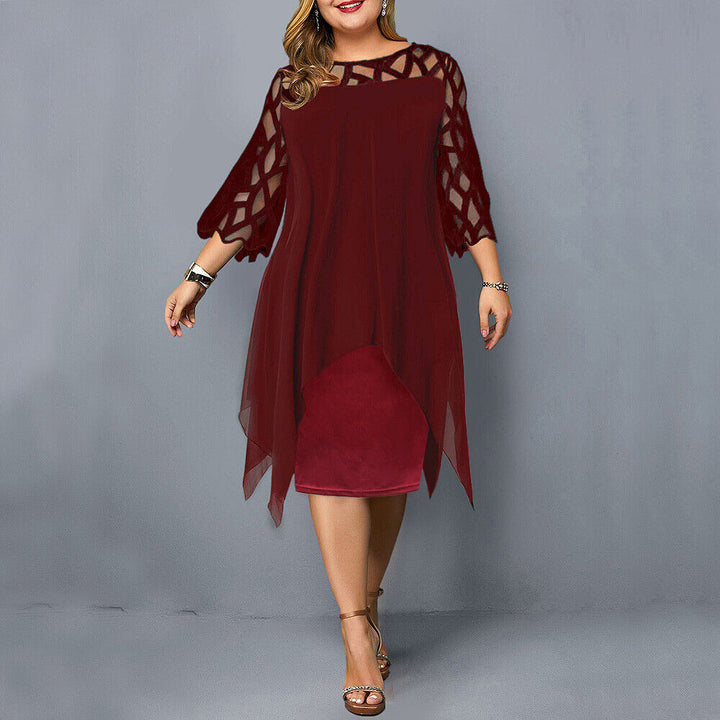 Plus size women's elegant midi dress with delicate lace sleeves, comfortable fit, perfect for evening.