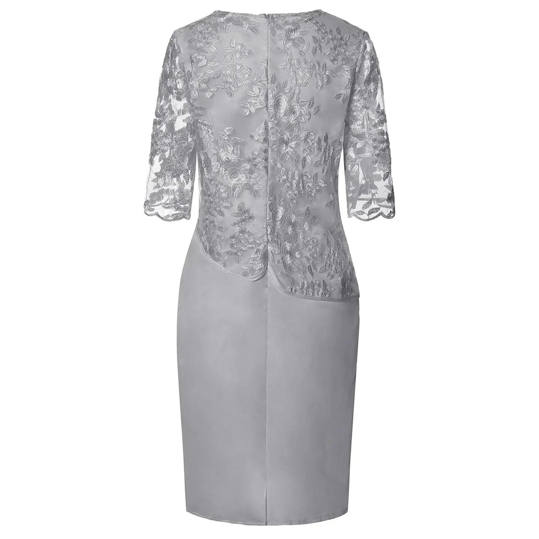 Beautiful plus size women's midi dress with three-quarter sleeves and lace overlay. Chic and elegant for any occasion.